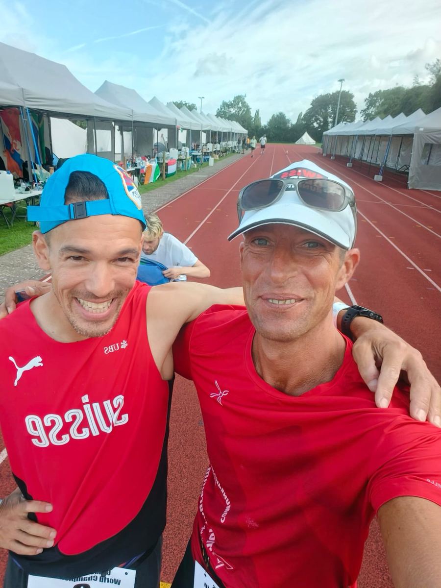 Dominik Erne and a teammate in Swiss kit taking a selfie