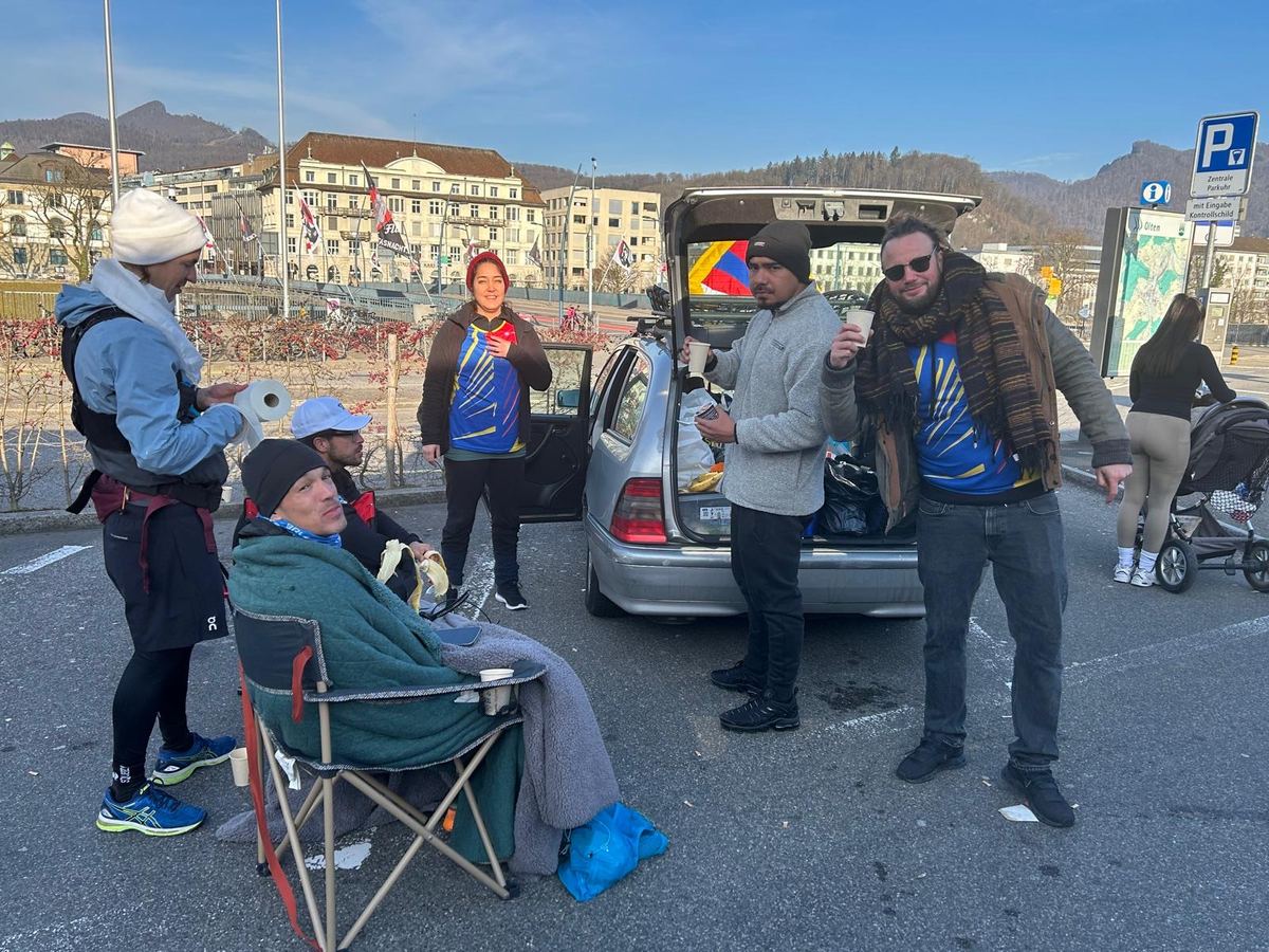The support crew with a car and camping chair