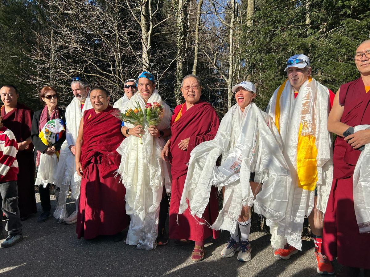 Monks and supporters with white khatas at the Tibet Institute Rikon