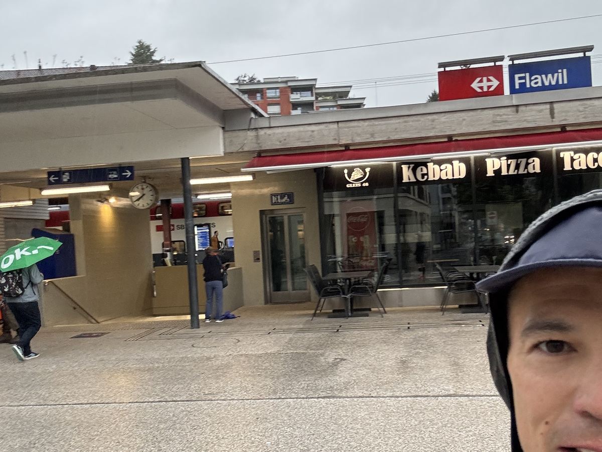 Dominik Erne at Flawil station in the rain