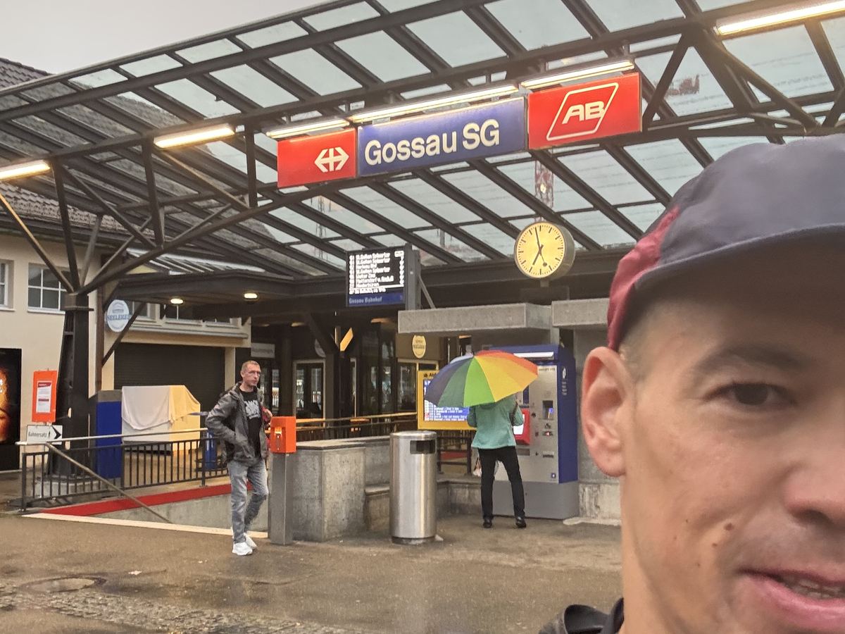 Dominik Erne at Gossau station in the rain
